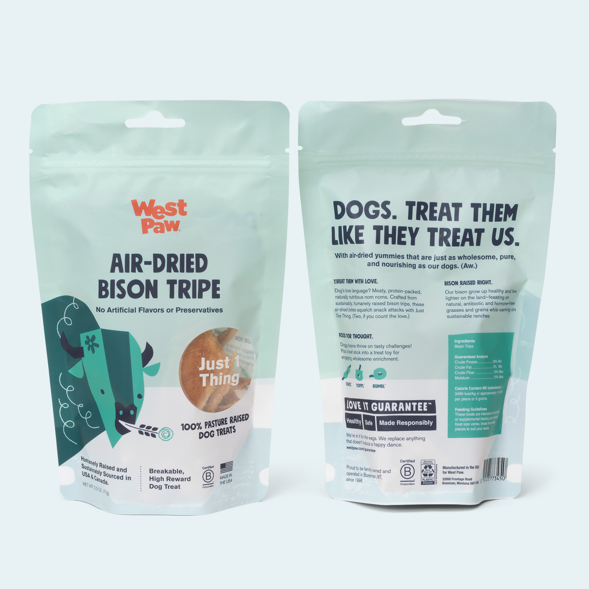 Two West Paw brand dog treat packages on a white background