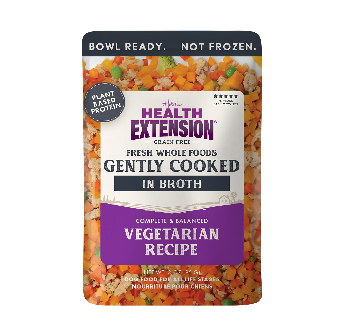 Health Extension dog food pouch with colorful ingredients on a white background
