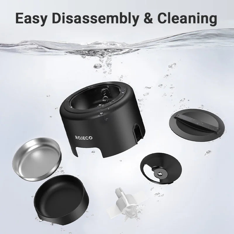 Black kitchen appliance with detachable parts on a water splash background, featuring the brand 'Rojeco'.