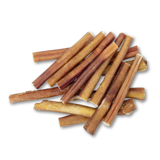 Thick 6 inch bully stick shown alongside a thinner stick to compare diameter