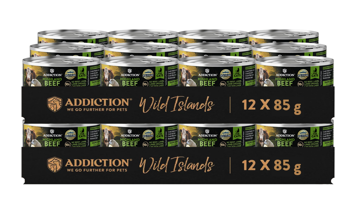 Multiple cans of Addiction Wild Islands beef dog food packaging.