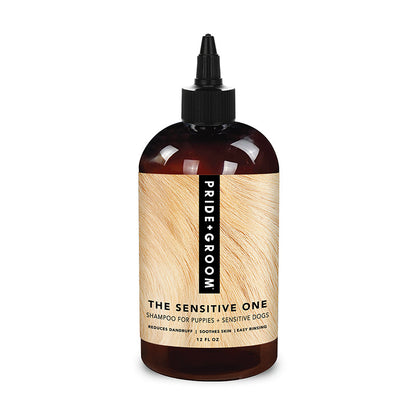 Bottle of Pride Groom The Sensitive One shampoo for dogs on a white background