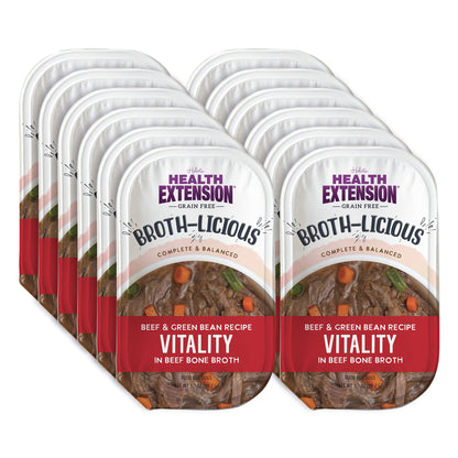 Multiple packages of Health Extension Broth-Licious dog food on a white background