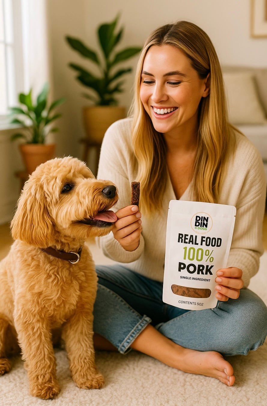 Woman holding a package of 'Real Food 100% Pork' treats for her dog in a home setting.