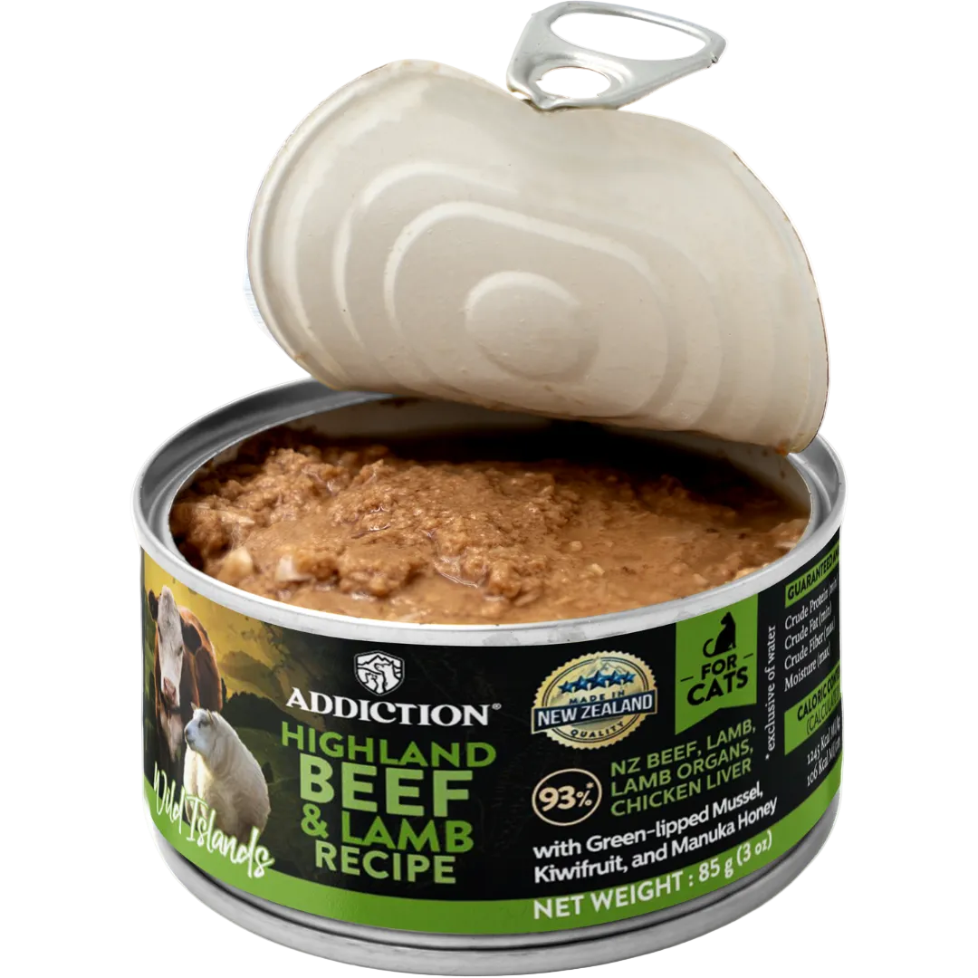 Open can of Addiction Highland Beef & Lamb Recipe cat food on a white background