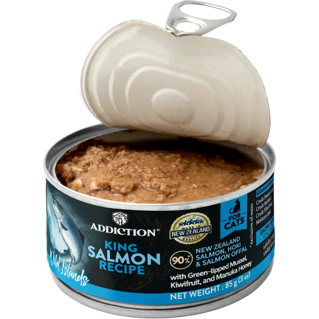 Open can of Addiction King Salmon Recipe cat food on a white background