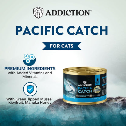 Addiction Pacific Catch cat food can on a rocky background with branding and product details.