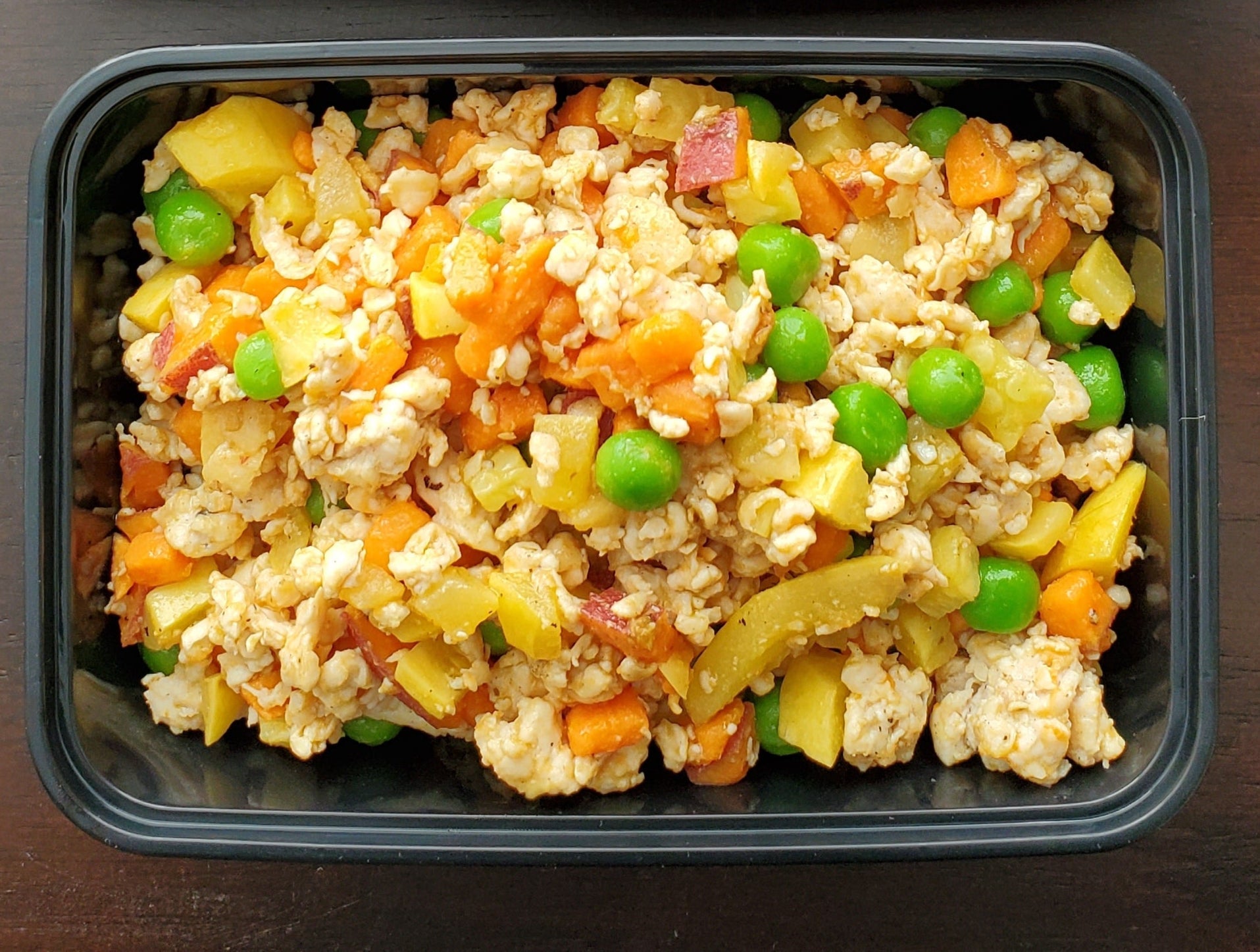 A thawed Din Din 4 Dogs meal served into a bowl at feeding time