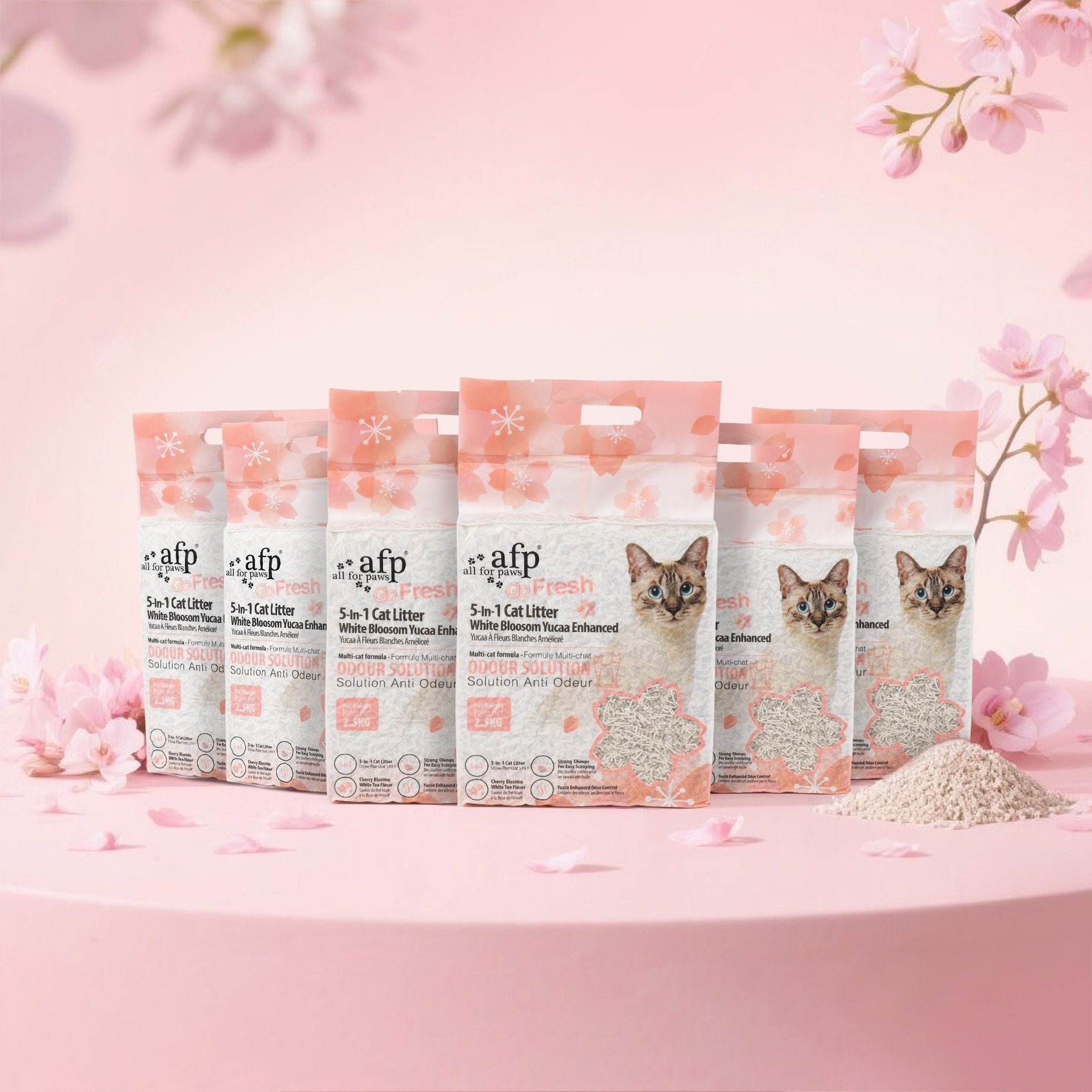Packaging of AFP cat litter on a pink background with cherry blossoms