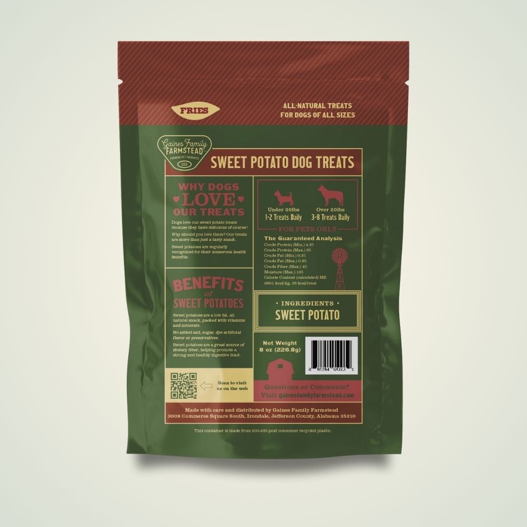 Green package of sweet potato dog treats with text and branding on a light gray background