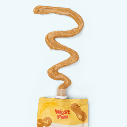 West Paw dog treat packaging with a wavy line of brown treat on a white background