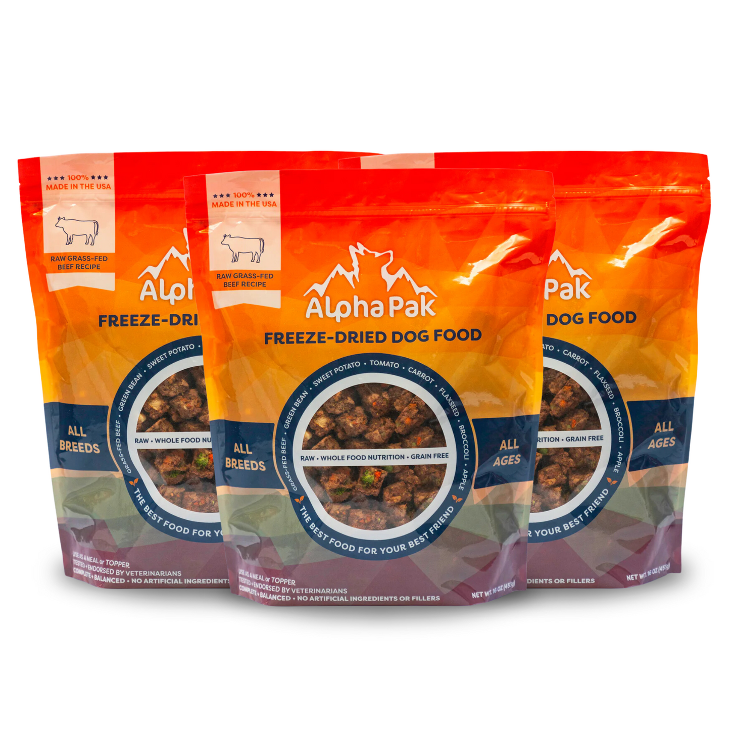 Three packages of Alpha Pak freeze-dried dog food on a white background