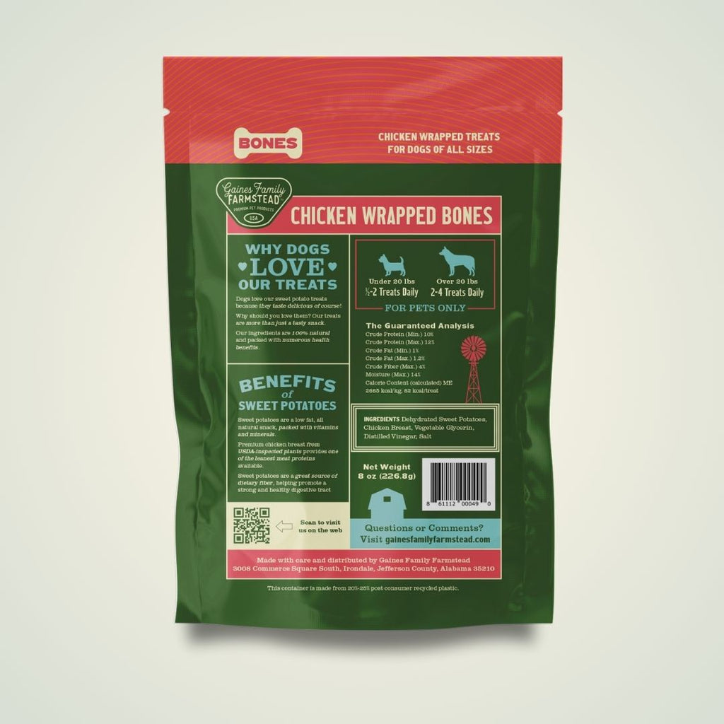 Green and red package of Chicken Wrapped Bones dog treats on a light gray background