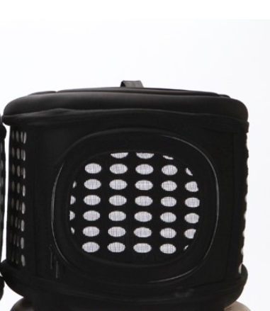 Black pet carrier with a grid pattern on a white background