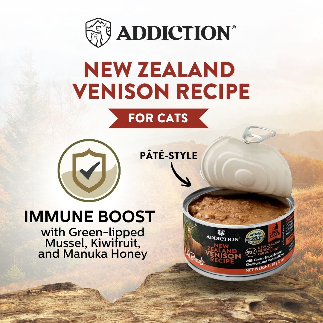 Addiction New Zealand Venison Recipe cat food can with promotional text on a scenic background