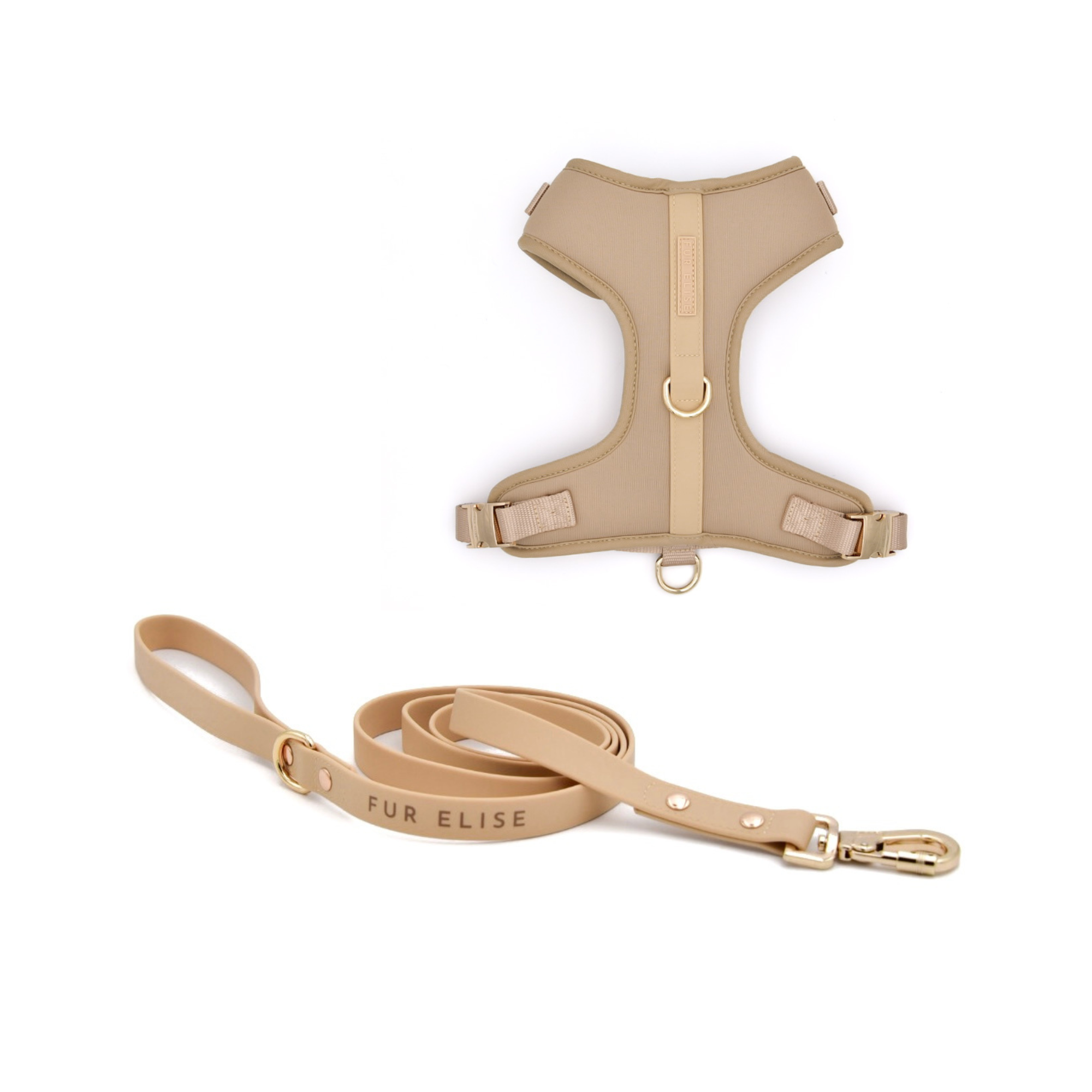 Beige dog harness and leash set on a white background