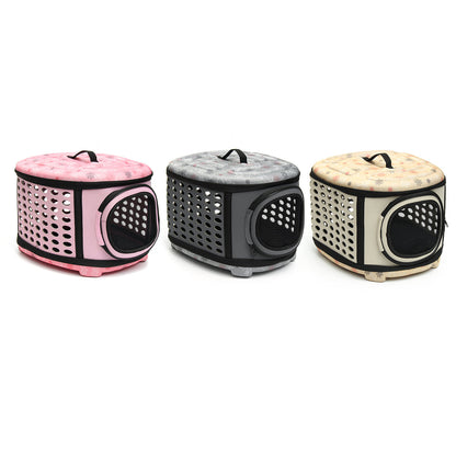 Three pet crates in pink, black, and beige on a white background