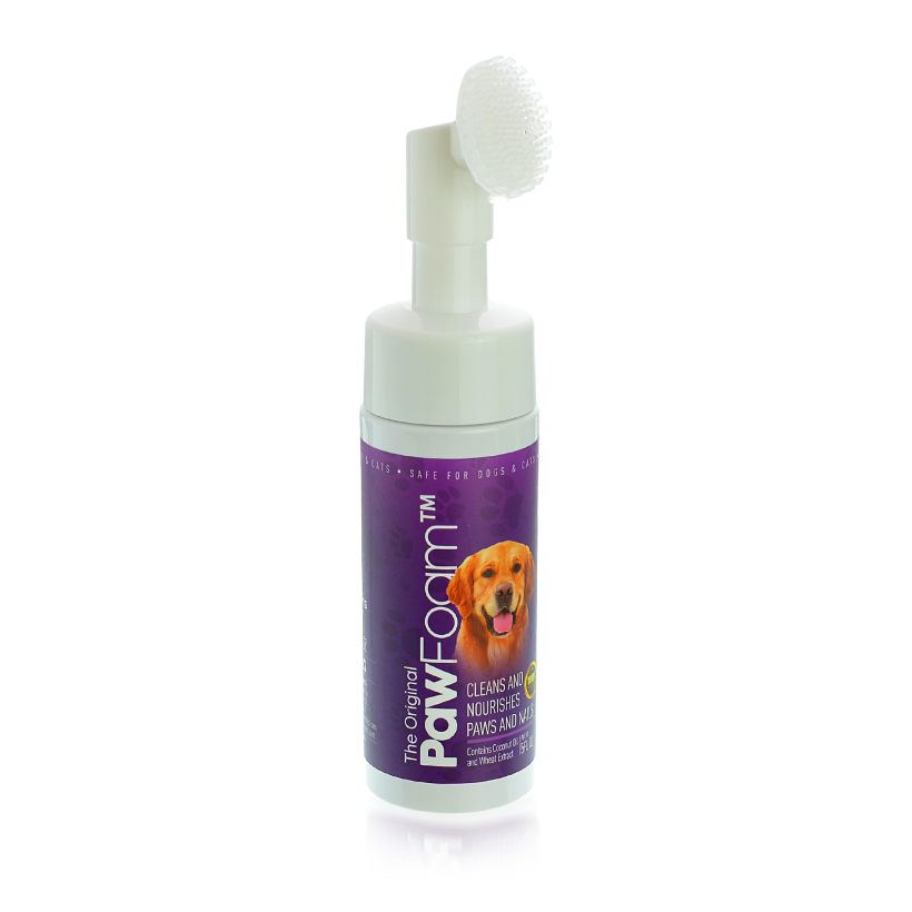 Dog paw cleaner with brush on a white background