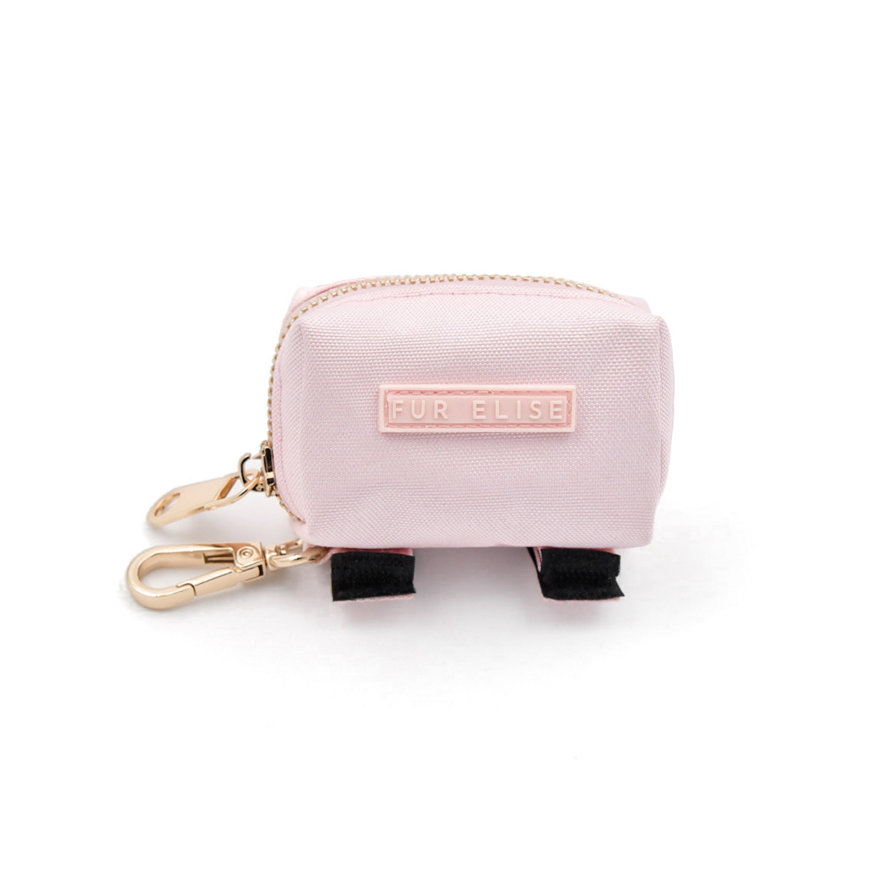 Pink pouch with gold clasp and black accents on a white background