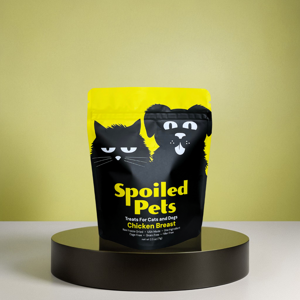 Bag of 'Spoiled Pets' treats for cats and dogs on a yellow background