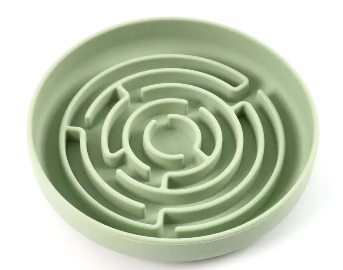 Green maze-like object on a white background