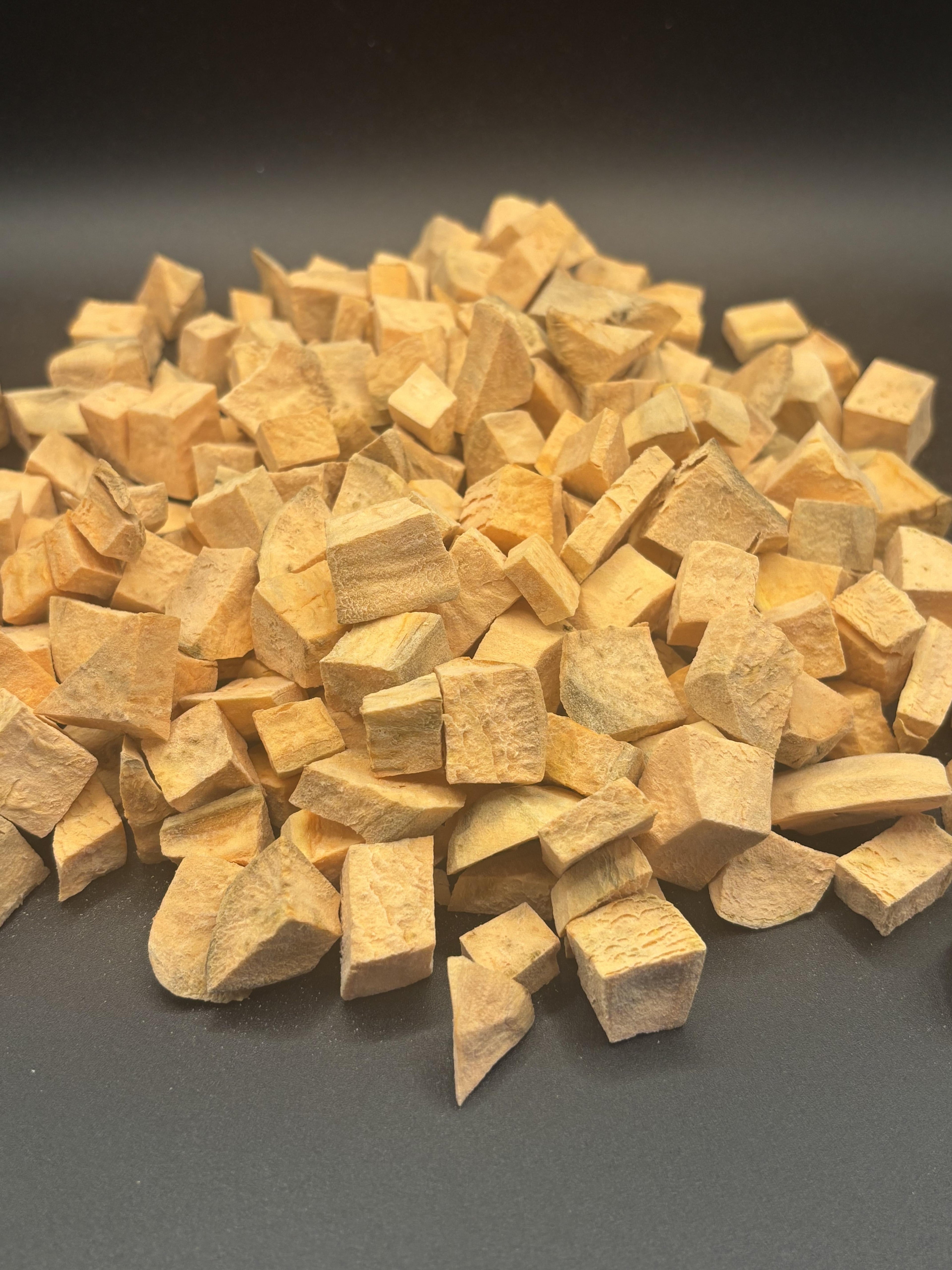 Pile of small wooden blocks on a dark background