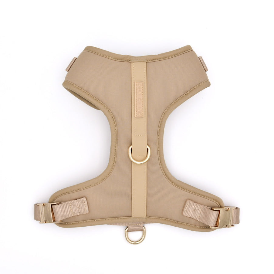 Beige dog harness on a white background