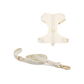 Cream-colored dog harness and leash set with 'FUR ELISE' branding on a white background