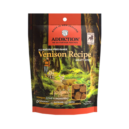 Addiction Venison Recipe dog food package with a forest scene and deer illustration.