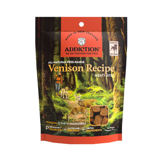 Addiction Venison Recipe dog food package with a forest scene and deer illustration.