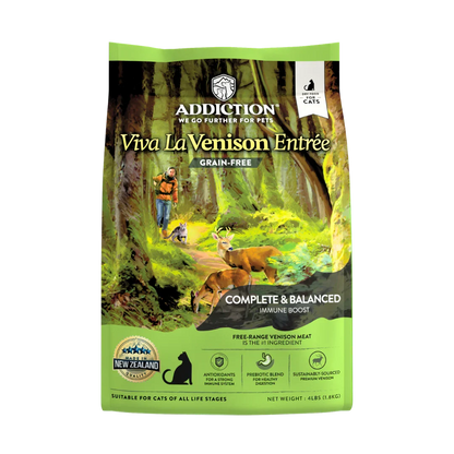 Viva La Venison Entrée grain-free cat food package with a forest scene on the label.