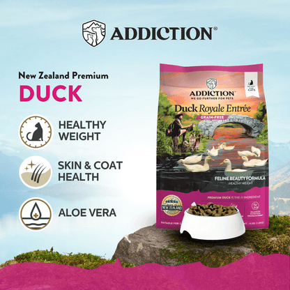 Addiction Duck Royale Entrée cat food package with product features on a scenic background