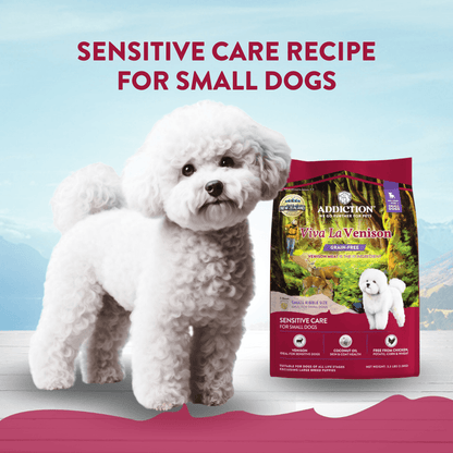 White dog standing next to a bag of Viva La Venison dog food with text 'Sensitive Care Recipe for Small Dogs' on a blue background.