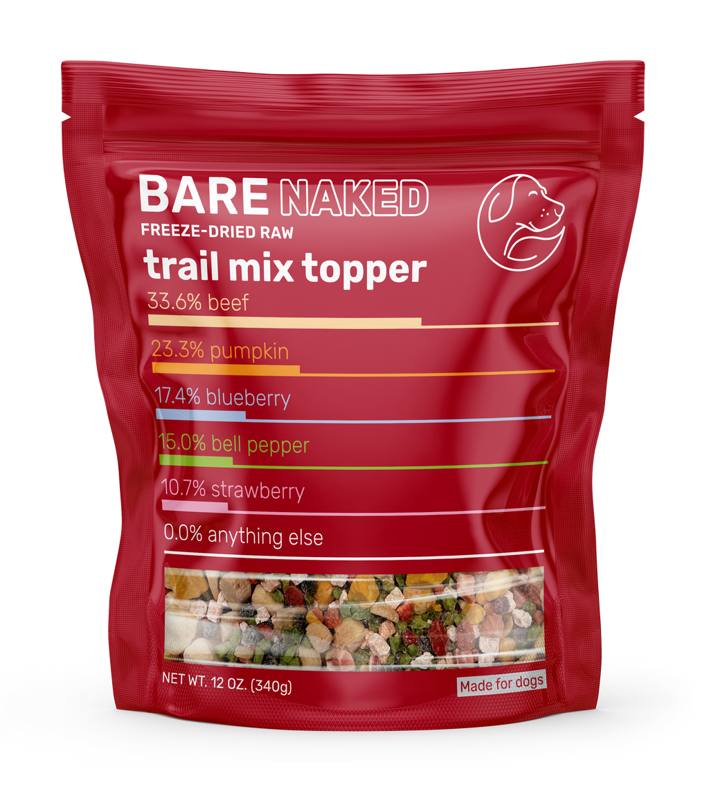 Red package of Bare Naked freeze-dried raw trail mix topper on a white background