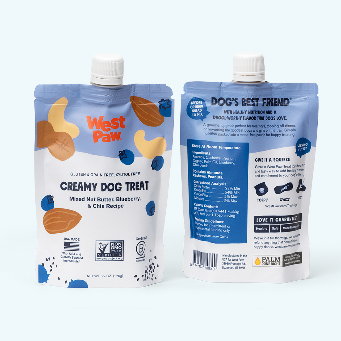 Two West Paw dog treat packages on a white background