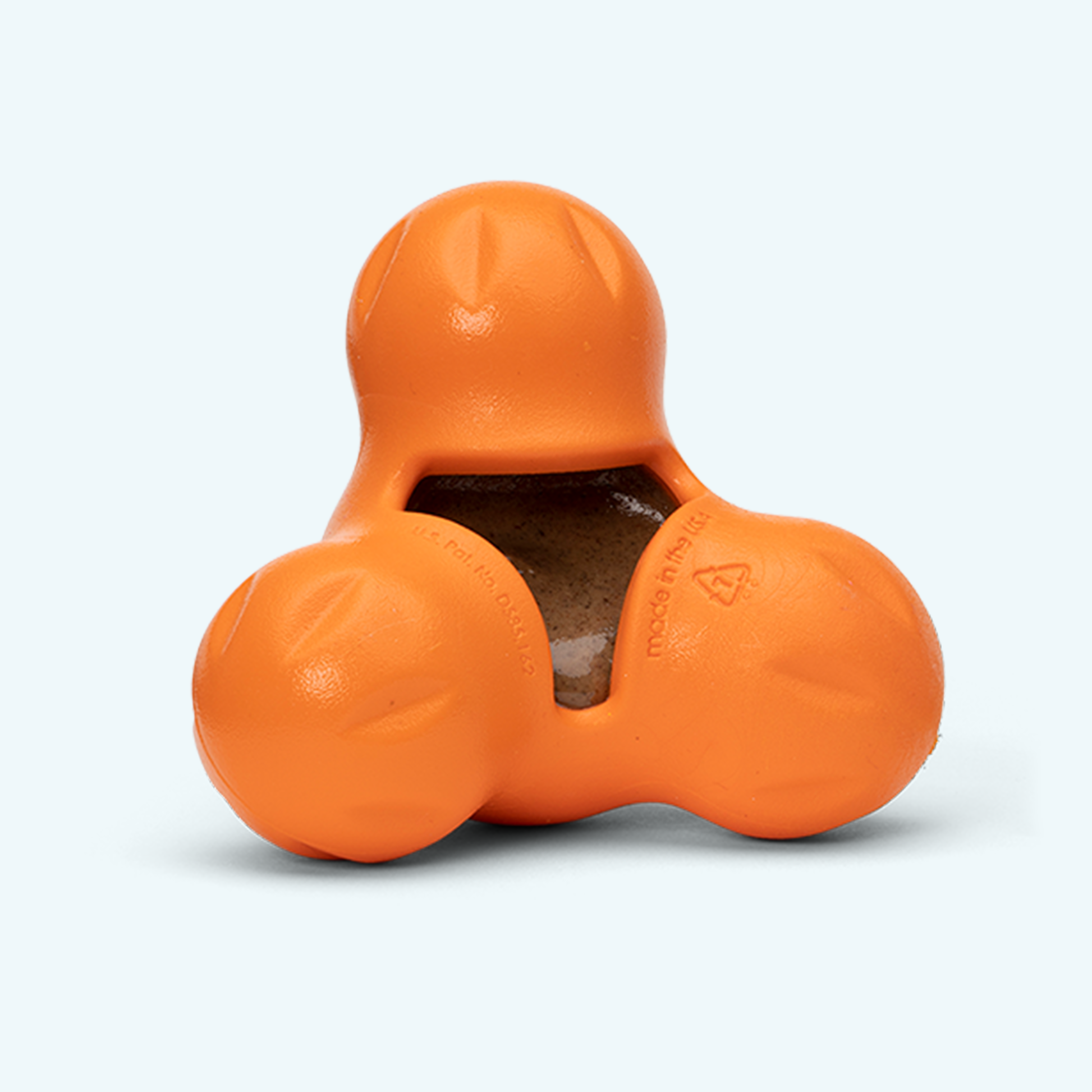 Orange dog toy with a white background