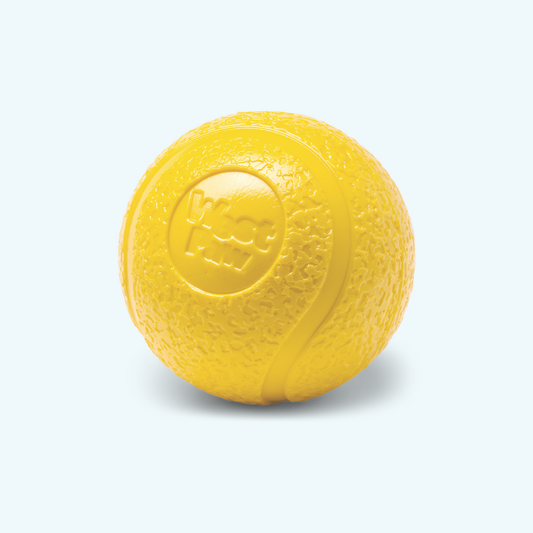 Yellow rubber ball with a brand logo on a light gray background