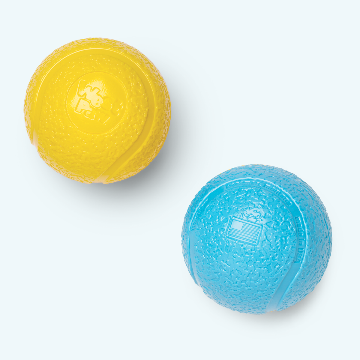 Yellow and blue textured balls on a white background