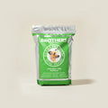Brothers Complete dog food package on a beige background