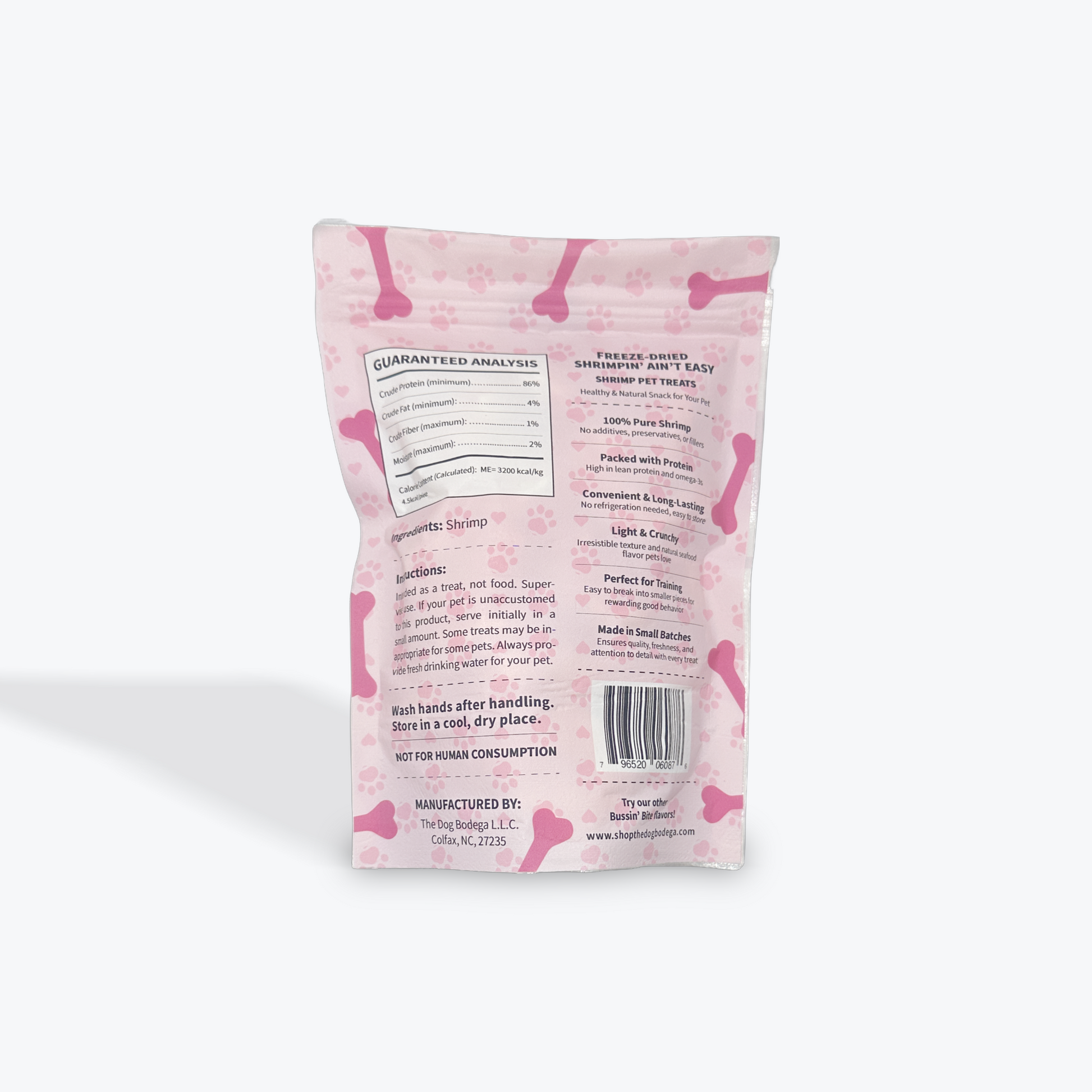 Pink bag of dog treats with text and a bar code on a white background