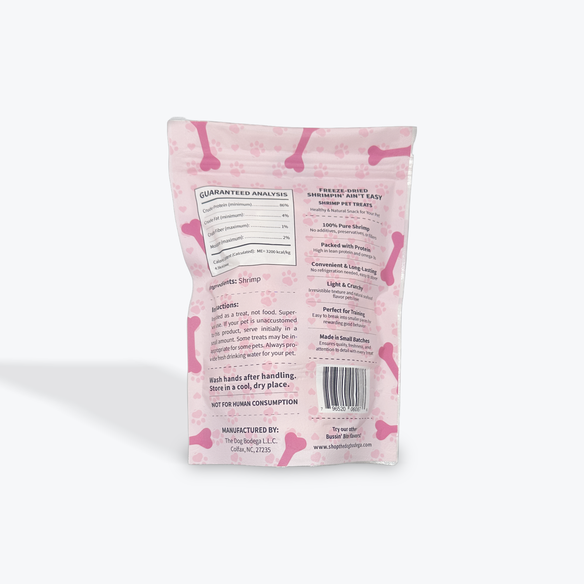 Pink bag of dog treats with text and a bar code on a white background