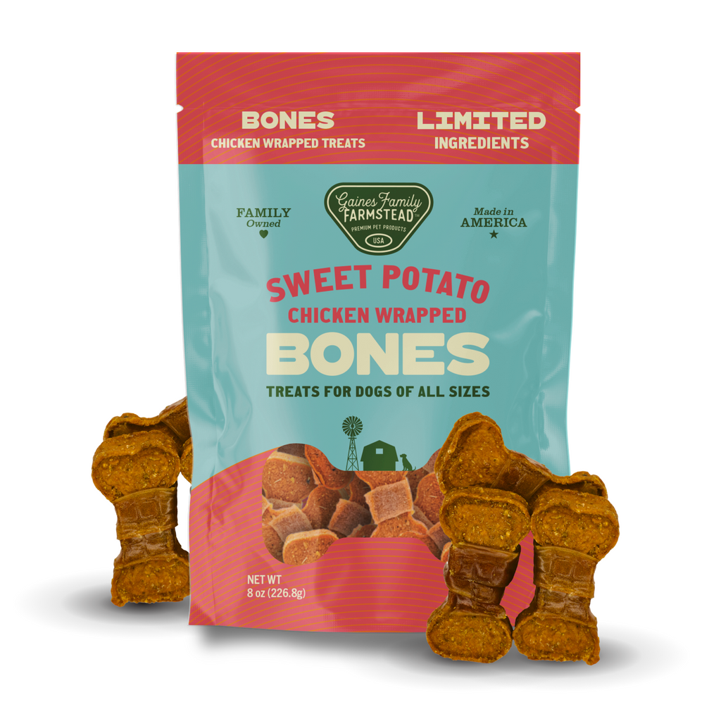 Package of 'Sweet Potato Chicken Wrapped Bones' treats for dogs with visible treats on a white background