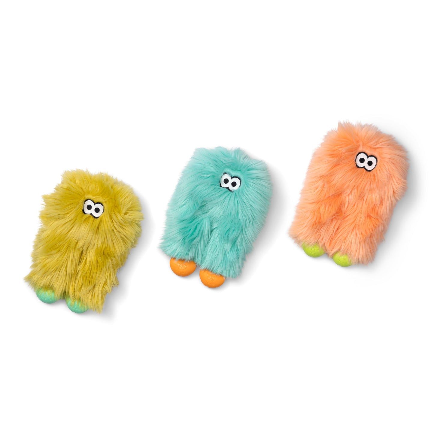 Three colorful fluffy toys with eyes on a white background