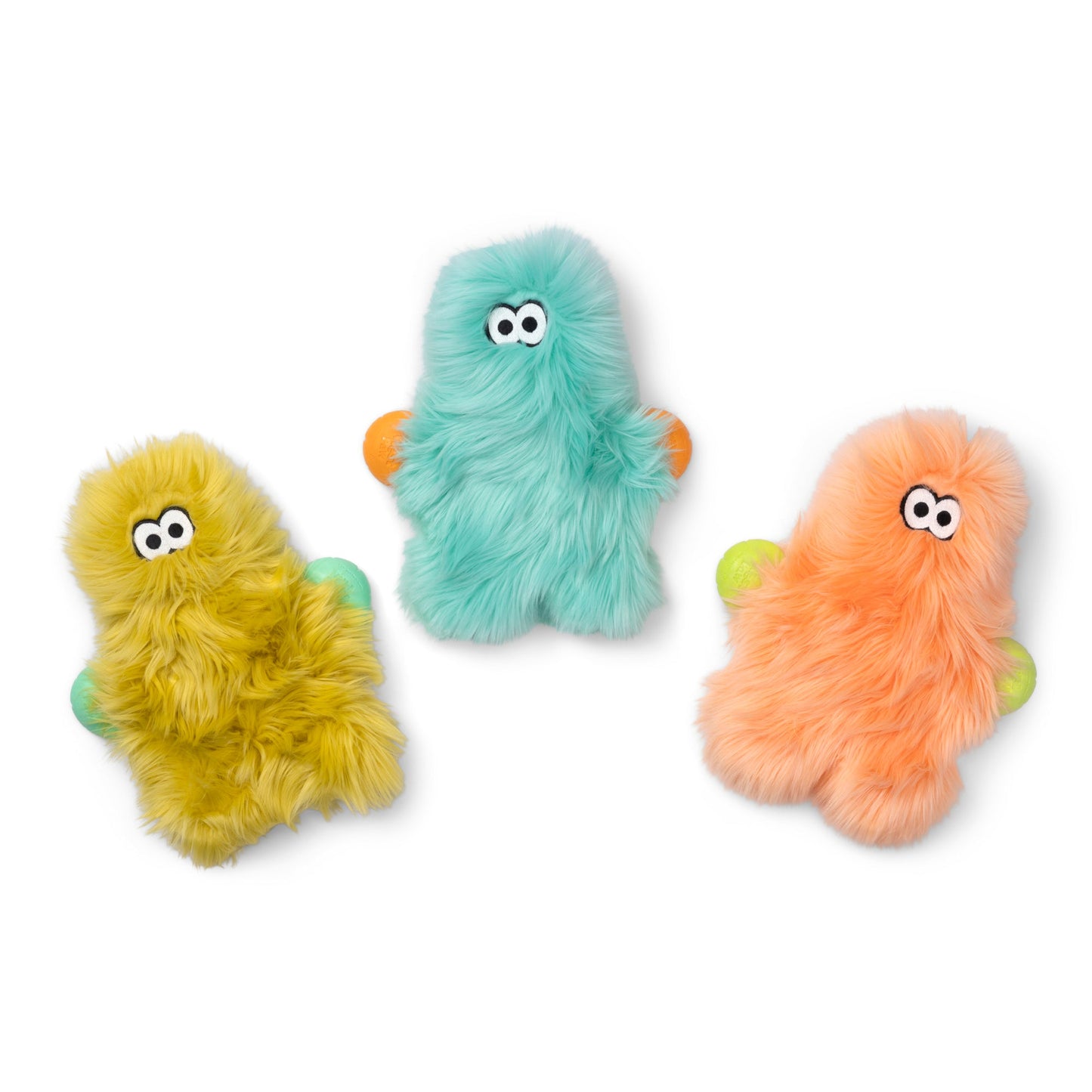 Three fuzzy monster-shaped plush toys in yellow, mint green, and peach-orange, each with large cartoon eyes and small colored limbs, shown on a white background.