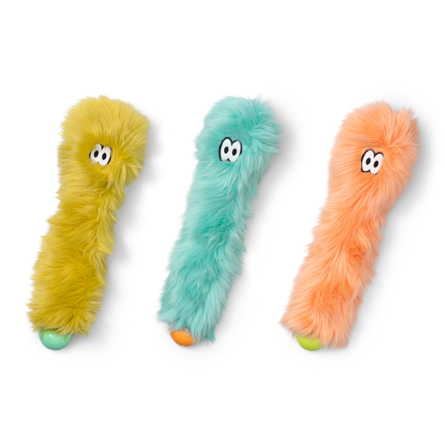 Three colorful fur toys with eyes on a white background