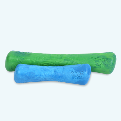 Two dog toys, one green and one blue, on a white background.