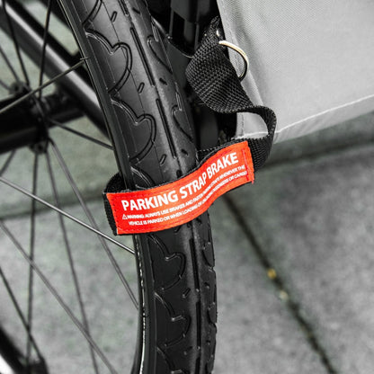 Bicycle wheel with a parking strap brake labeled on a blurred background
