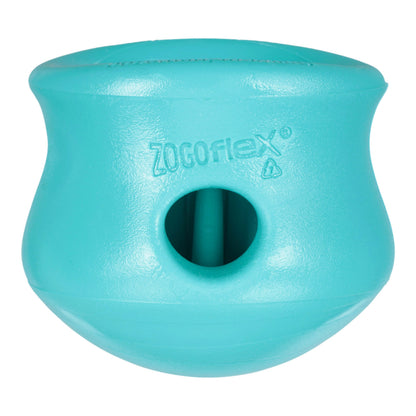 Turquoise dog toy with a central hole on a white background