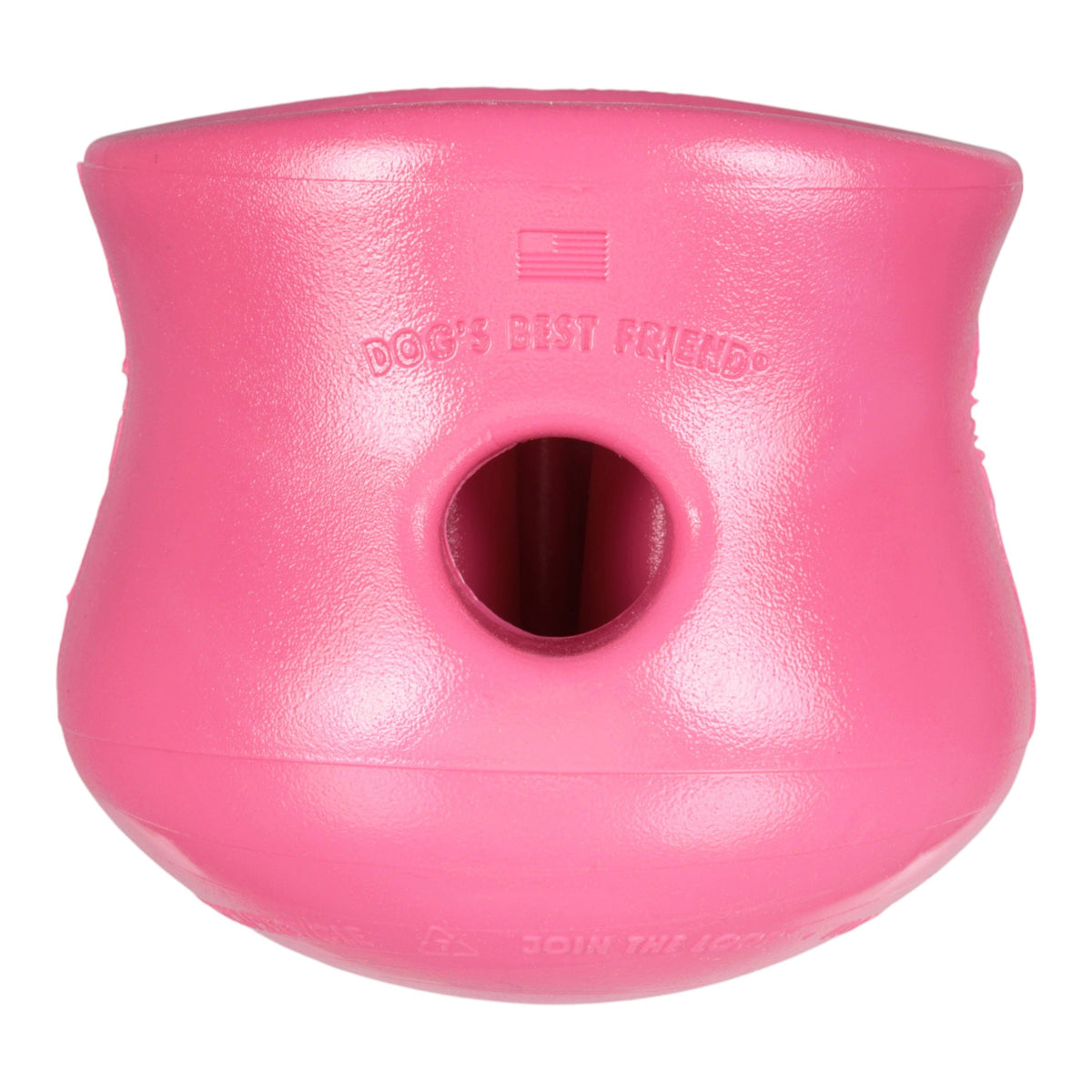 Pink dog toy with a central hole on a white background