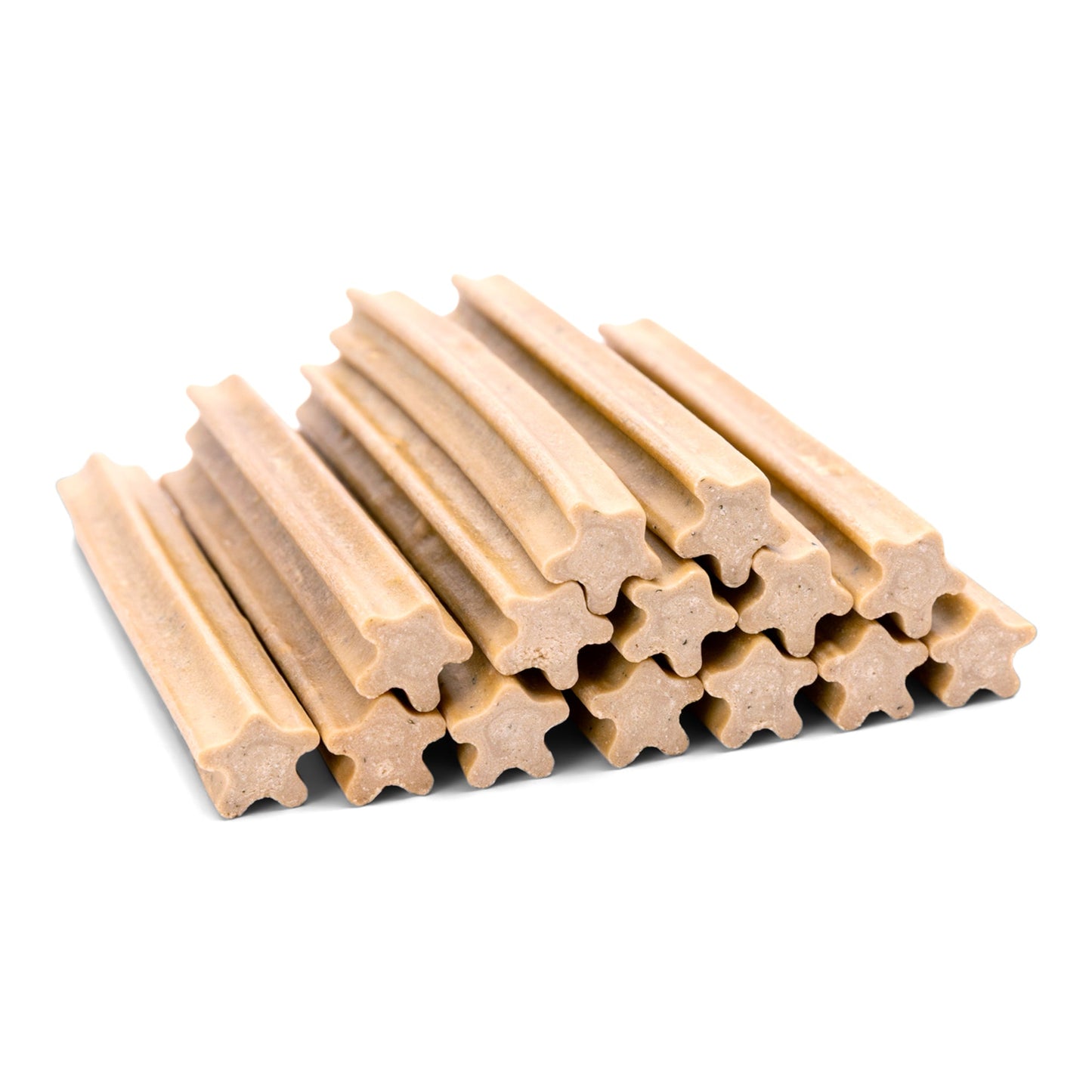Stack of beige dog chew sticks on a white background